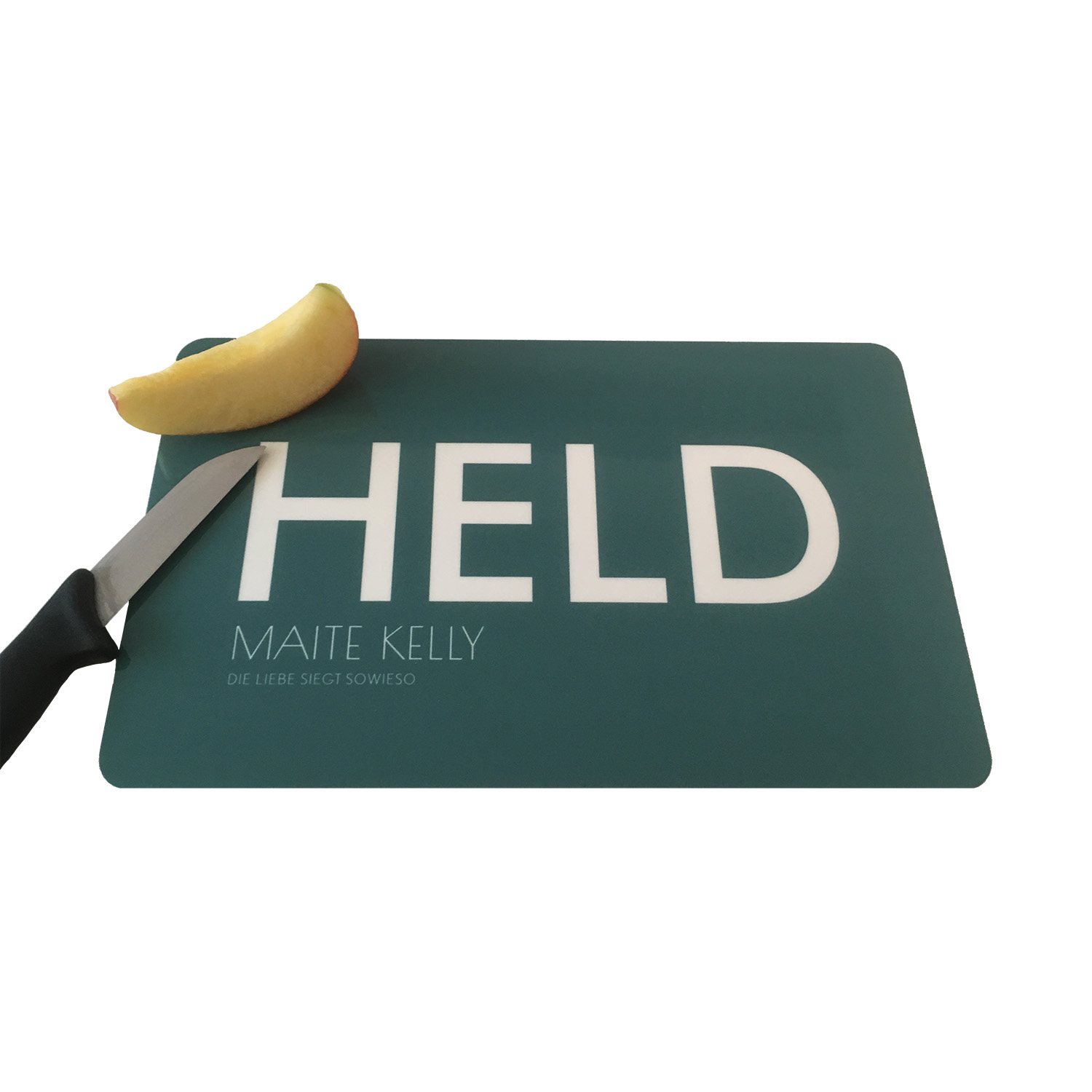 Maite Kelly Held Frühstücksbrettchen petrolgrün